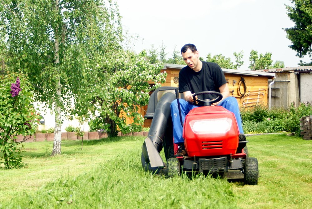 garden tractor mowing lawn